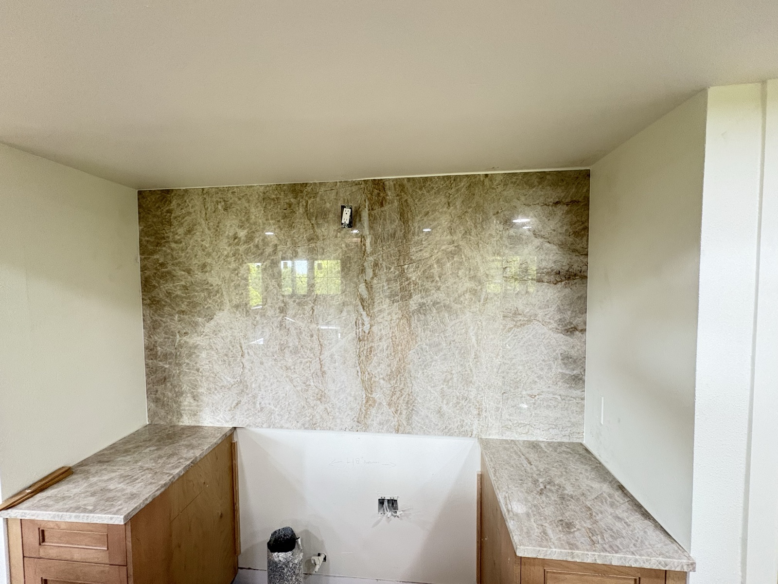 Full-slab quartzite tub surround and matching counters